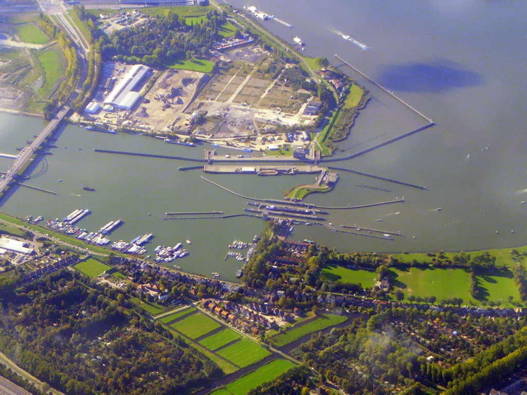 Aerial view of the Oranjesluizen lock complex between the IJ and Buiten-IJ, showing multiple parallel lock chambers.