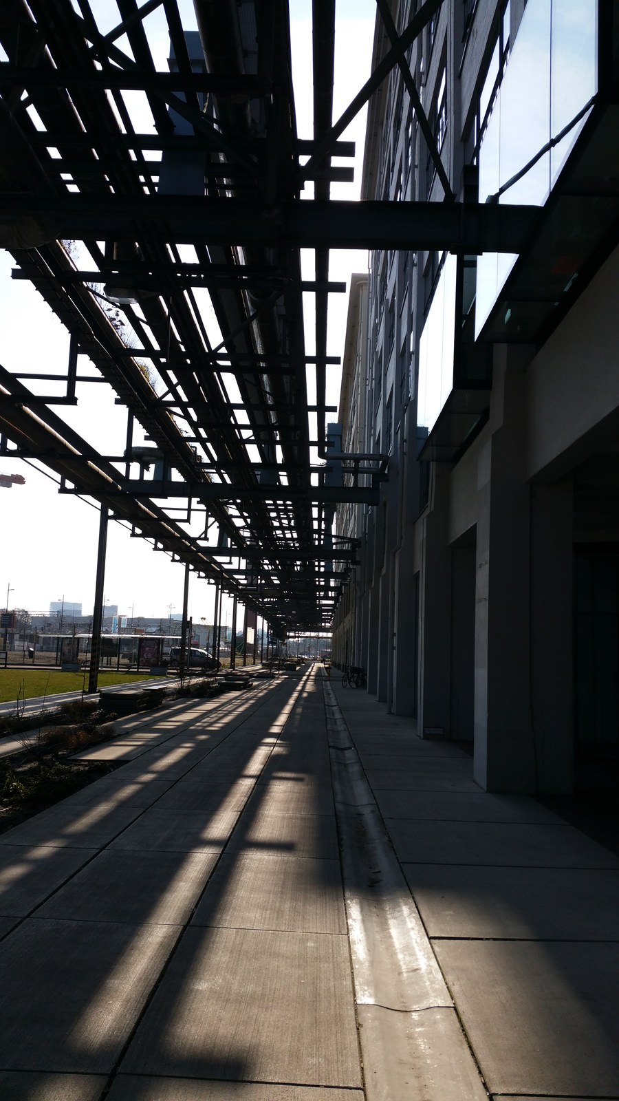 The elevated Strijp-S Leidingstraat pipe structure runs between former Philips industrial buildings in Eindhoven.