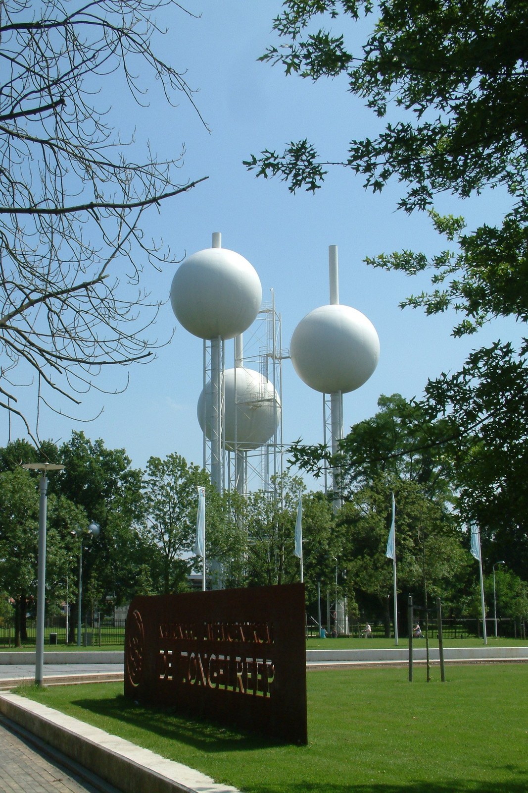 Eindhoven’s three white spherical Waterbollen rise on slender supports above the surrounding park.